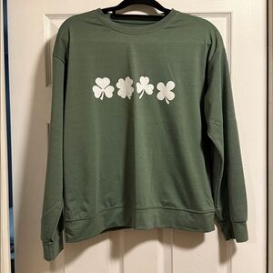 Green lightweight tee shirt with White Clover Design. Size medium